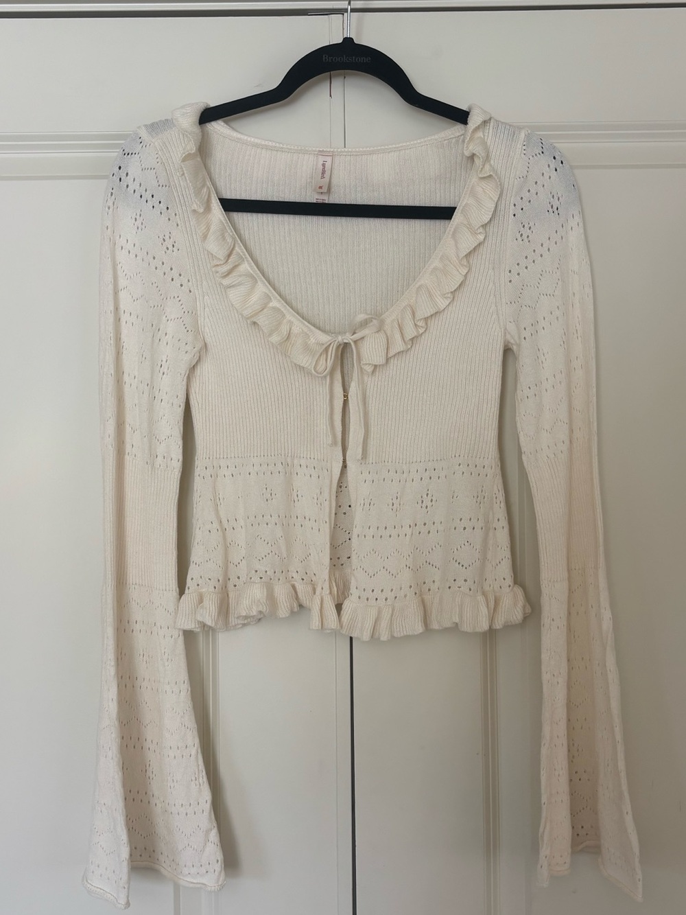 Anthropologie Cream Ruffle-Trim Knit Top with Tie Front
